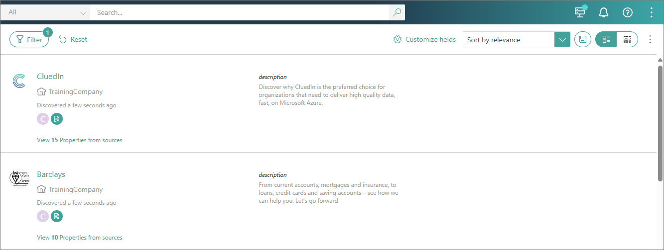 Search results in tile view, each golden record shown as a tile with name, business domain, discovery time, and description